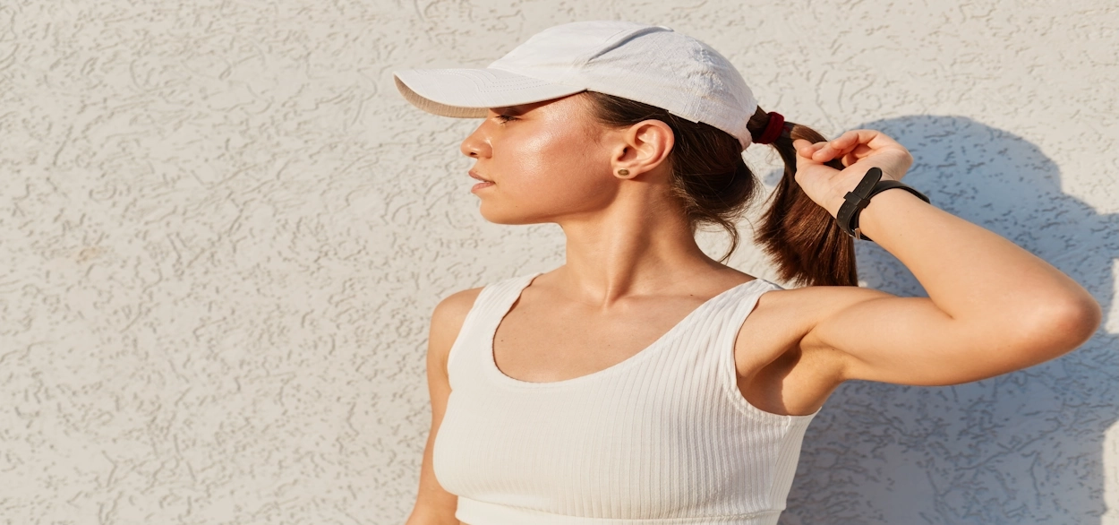 a woman wearing an unstructured hat